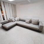 Modern Minimalist L-Shaped Modular Sofa with Integrated Side Table & Suspended Metal Base